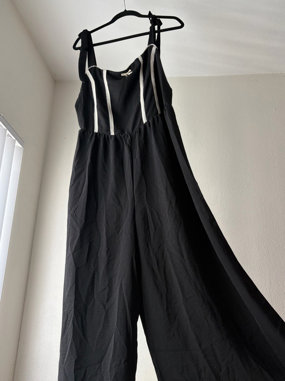 Black adjustable tie Straps Jumpsuit with Cream Trim and Bow Detail